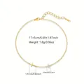 Detailed view of gold stainless steel bracelet with cross and zircon flower charms. - Rhinestone Flower and Cross Bracelet (LM059SL)