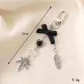 Black bow keychain with heart star and leaf charms for bag decoration - Black Bow + Leaf Pendant