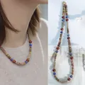 Vintage Halskette im französischen Palaststil mit blauen Türkis- und roten Perlen - Bunte ethnische Vintage-Halskette mit braunen Perlen