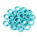 Pile of synthetic turquoise style rings with blue and black veins for jewelry making - 18-20mm Inner Diameter / Artificial Turquoise