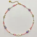 Handmade vintage beaded necklace featuring natural stones pearls and star charms on white background - Style 6 (Necklace)