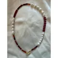 Detailed view of natural pearl and red stone beaded necklace with gold toggle clasp. - Style 26 (Necklace)