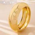 Elegant minimalist gold-colored bangle bracelet with unique hammered texture design - Hammered Texture Style (S16-4-03-2) / Gold