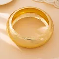 Elegant wide gold-toned bangle bracelet with intricate embossed rose floral pattern details - Rose Relief Style (S16-4-03-4) / Gold