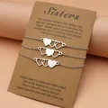 Set of 3 stainless steel heart charm bracelets for sisters with sentimental message card - Three-Piece Set / Silver