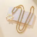 Elegante vergulde roestvrijstalen ketting met een ster van David hanger aan een boxketting - Hexagram venetiaanse ketting - Goudkleur