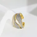 Detailed view of a unique irregular gold-plated ring with grey marble enamel inlay - One Size / Blue Enamel Style (B358)
