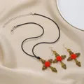 Vintage bronze Gothic cross jewelry set featuring red roses on a black cord necklace - Choker and Earrings Set / Red