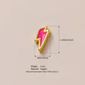 Small lightning bolt bead with pink enamel and gold-plated copper finish - Bolt