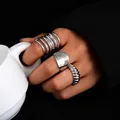 Gothic style silver open ring set with multi-layer and textured designs on hand. - Gothic Spiral Wide Surface 3-Piece Set (6314802HB) / Silver