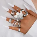 Gothic style silver hollow geometric ring set worn on hand with long white nails. - Gothic Punk Geometric Style (6482901HB) / Silver