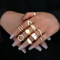 Multi-piece set of gold gothic geometric open rings worn on hands against dark background - Gold Gothic Geometric Set Style (6510901HB) / Set of 6 / Gold