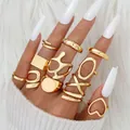 Gold-plated ring set featuring hollow heart and geometric shapes on a plush white background - Hollow Heart Geometric Square Style (6233901) / 22-Piece Set / Gold