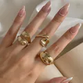 Elegant gold-colored geometric open ring set with a beautiful abstract minimalist design - Gothic Geometric Open Ring Set (3 Pieces) (5951301HB) / Gold