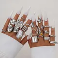 22-piece gothic silver ring set with geometric and flower designs on model hands - Gothic Embossed Flower Pearl Style (6542602HB) / 22-Piece Set / Silver