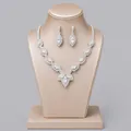 Elegant silver bridal jewelry set featuring sparkling marquise crystals on a display stand - Bridesmaid Banquet Jewelry Set (NS-J6496S) / Silver