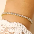 Elegant gold plated tennis bracelet featuring square clear cubic zirconia stones on wrist - 14k Gold Clear Zirconia (0784)