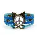 Multilayer blue woven bracelet featuring a colorful butterfly peace sign cabochon charm. - Butterfly Peace Sign Style (XSWX9441) / Blue