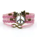 Pink layered braided bracelet with butterfly charms and colorful peace sign - Butterfly Peace Sign Style (XSWX9441) / Pink