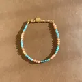 Bohemian beaded bracelet with blue and peach natural stones in a high-detail close-up - Sky Blue and Peach Alternating Style (Bracelet 11)
