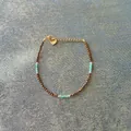 Handgemaakte natuursteen kralenarmband met gouden hartbedel en een stevige sluiting - Armband (Zelfde Stijl) / 17+3cm / Tijgeroog