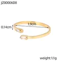 Elegante anillo abierto de acero inoxidable chapado en oro 14K con dos circonitas - Oro + Circonita Blanca Clara