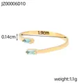 Anillo abierto de acero bañado en oro con dos circonitas rectangulares azul claro. - Dorado + Circonita Azul