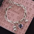 Retro silver chain bracelet featuring a cute bear and iridescent square gemstone pendant. - Bear & Iridescent Rhinestone Style (SL0274)