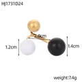 Elegante anello geometrico con sfere smaltate oro bianco e nero dal peso di 7,4g - Perle Nere Bianche e Oro (HJ1731D24)