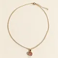 Vue détaillée d'un collier en chaîne dorée avec pendentif rond en calcédoine rose sur fond uni. - Chaîne Or Rose / Style Calcédoine Rose (XL211)