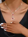 Elegant silver-toned jewelry set with red crystal water-drop necklace and earrings - 670 Red