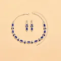 Elegant silver-plated jewelry set featuring deep blue teardrop crystals and rhinestones - 651 Blue