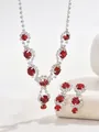 Elegant silver necklace and earring set with vibrant red crystals and sparkling rhinestones - 498 Red