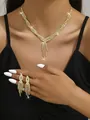 Luxury gold-tone necklace and earring set with shimmering crystals and tassels - 733 Gold