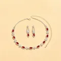 Elegant necklace and earring set featuring red and white crystals in a gold-tone finish. - 651 Red