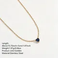 Elegant gold stainless steel heart pendant necklace with blue birthstone detail - Dark Blue