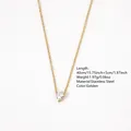 Golden stainless steel necklace with a heart-shaped clear gemstone pendant - White
