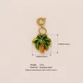 Exquisiter tropischer Palmblatt-Anhänger aus Edelstahl mit grün-goldener Oberfläche für DIY - April Blumenanhänger