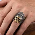 Detailed close-up of a vintage stainless steel Indian feather skull ring for men - Size 7 / Two-tone (Gold & Silver)