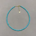 Detailed view of bohemian turquoise beaded necklace with golden heart charm pendant - One Size / Blue Green Turquoise Style (Style 17)