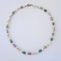 Detailed view of irregular colored natural stones and pearls on a vintage necklace. - One Size / Light Purple Green Artificial Pearl Necklace