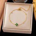 Elegantes goldenes Titanstahlarmband mit grünem Zirkonia-Kleeblatt in Geschenkbox - Grüner Zirkonia Kleeblatt Armband(E2123) / Gold
