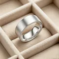 Close-up of 8mm brushed titanium steel ring showing matte texture and polished interior - US Size 8 / Matte Plain Style / 8mm Wide / Silver