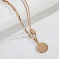Detail shot of rose gold double-layered necklace with an engraved round pendant - Rose Gold