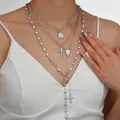 Élégant ensemble de colliers argentés à plusieurs rangs avec croix et glands de perles - Ensemble de colliers multicouches en perles artificielles argentées Croix Vierge Marie (6522502HB)