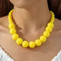 Vibrant bohemian statement necklace featuring graduated large yellow acrylic beads - Gradient Single Layer Beaded Style (30222) / 18mm Bead Diameter / Bright yellow