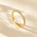 Detailed close-up of a golden titanium steel ring featuring a studded diamond pattern - US 5 / Rhinestone Studded Gold Ring