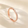 Detailed view of rose gold titanium steel ring featuring rivets and rhinestones - US 5 / Rhinestone Studded Rose Gold Ring