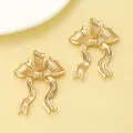 Elegant gold ribbon bow stud earrings with textured metallic finish for a sophisticated look - Pleated Textured Bowknot Stud Earring (N-351)
