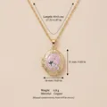 Vintage gold floral locket necklace detail with product dimensions and copper material info - Oval Light Pink Style (3)